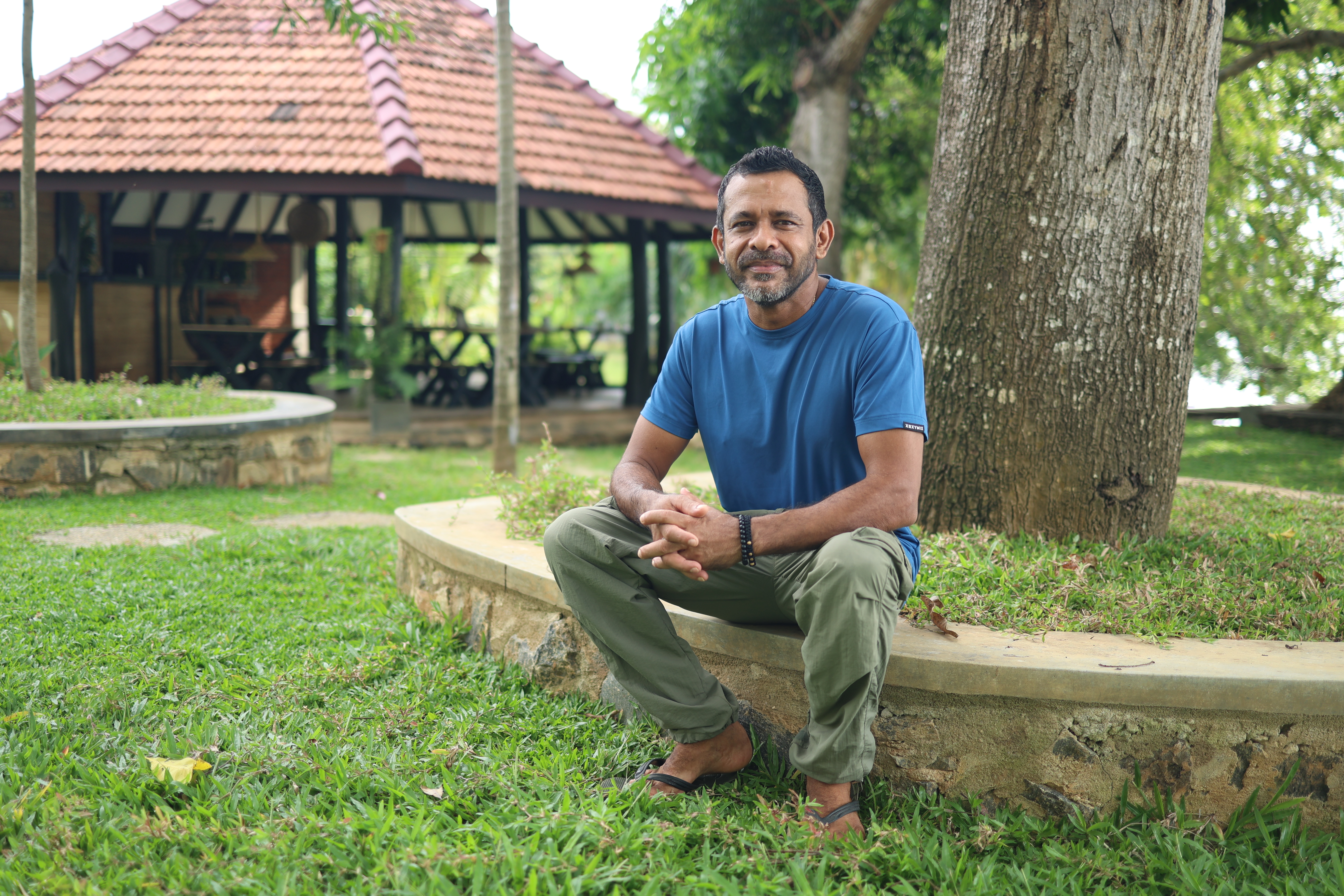 Ajith at the farm he built