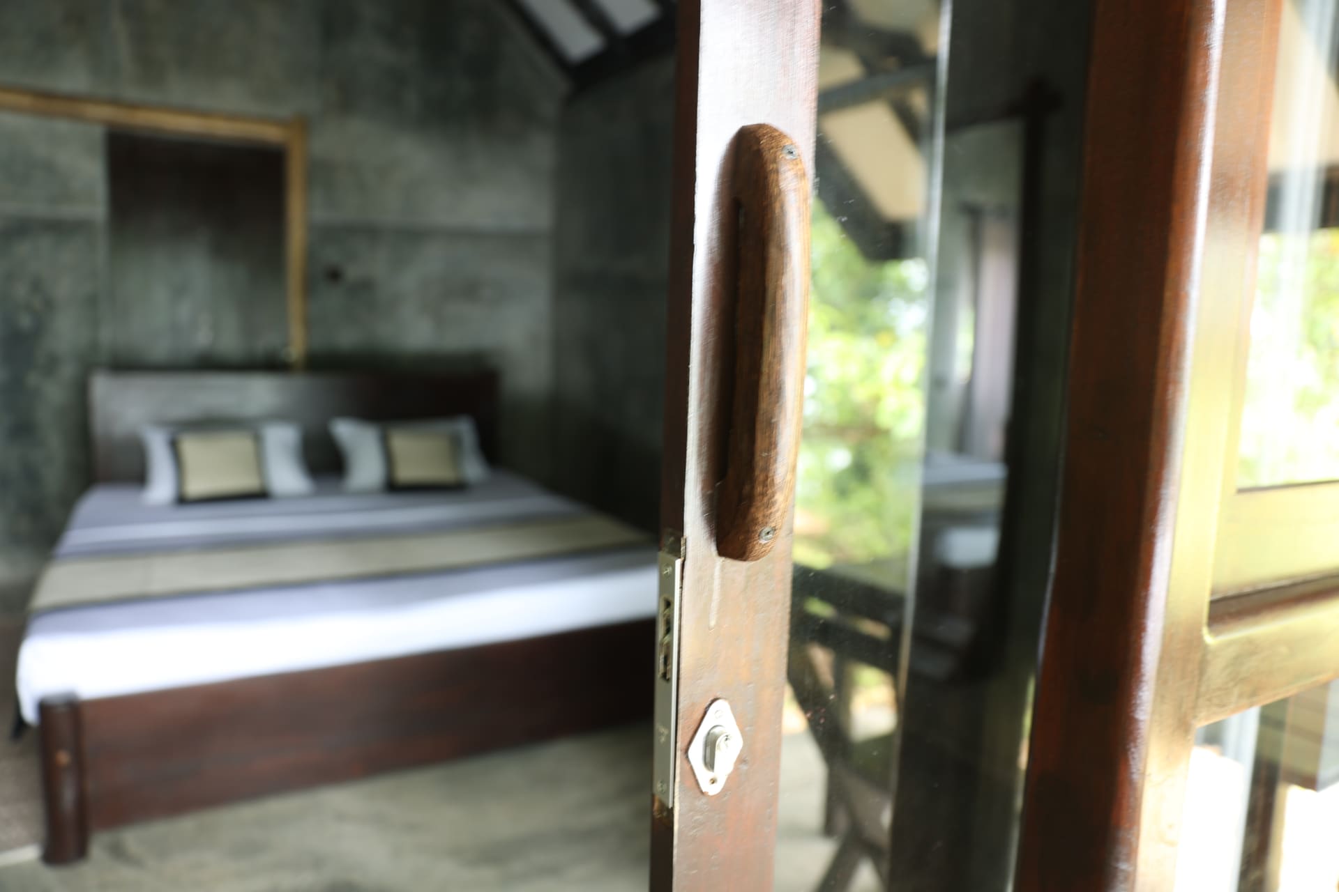 Bedroom interior — bed beyond the open door