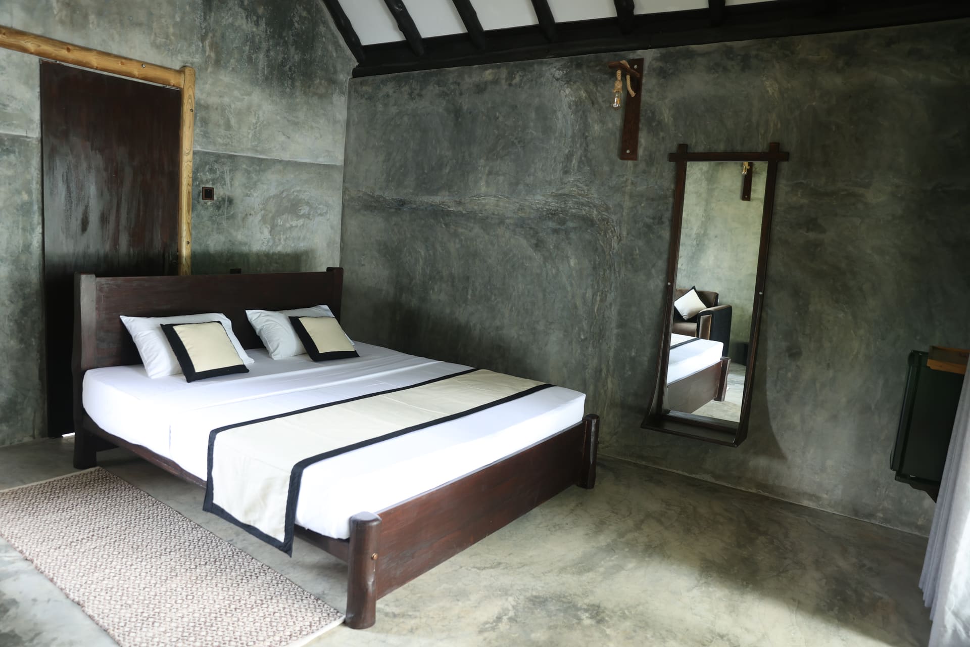 Inside the cottage — bedroom and seating area