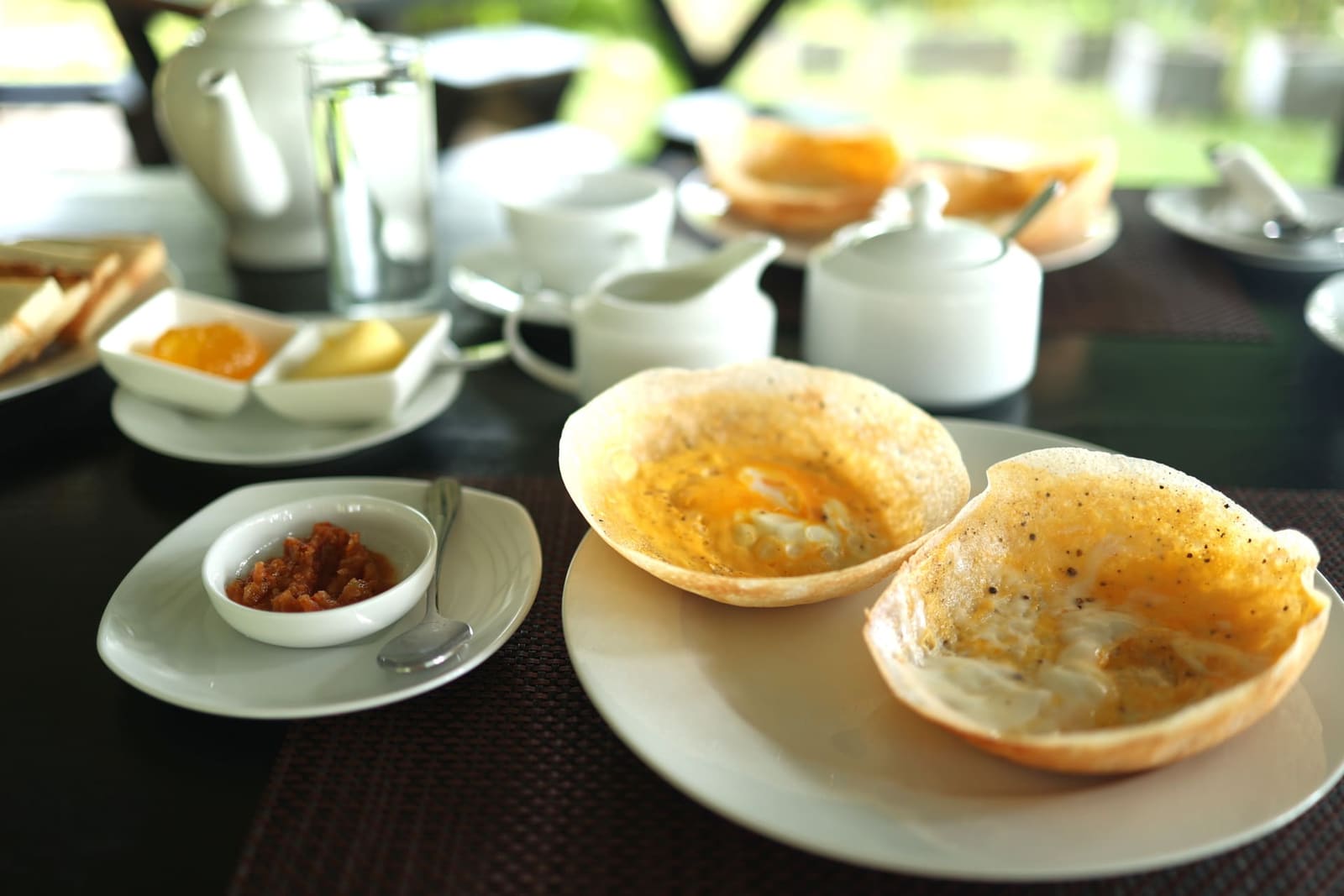 Sri Lankan hoppers with sambol — traditional breakfast at Aji Fruit Farm