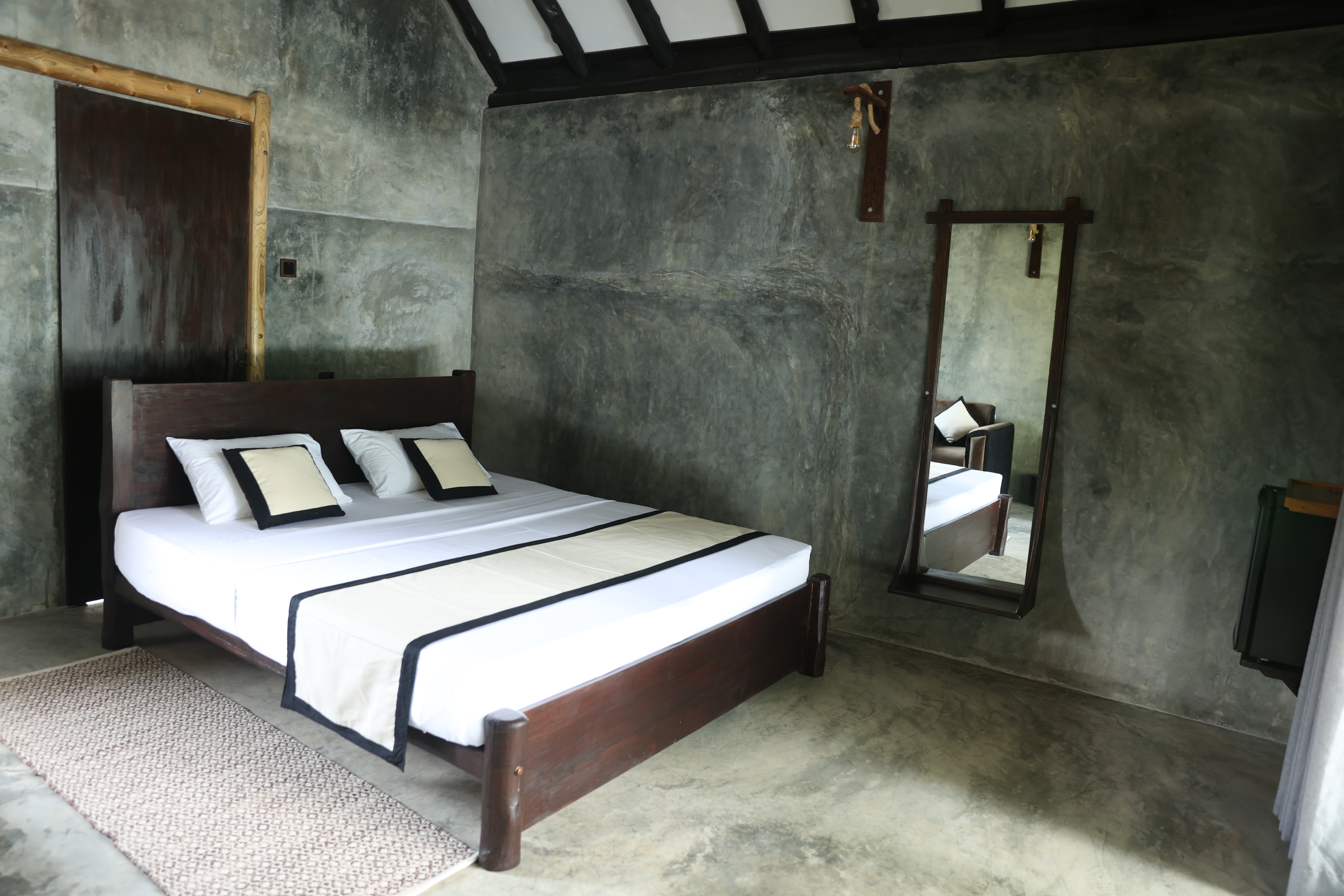 Queen teak bed with white linen